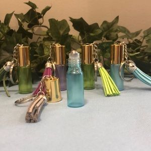 3 oil roller keychains